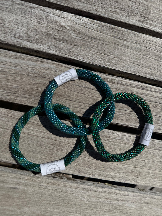 Le trio népalais bleu vert canard