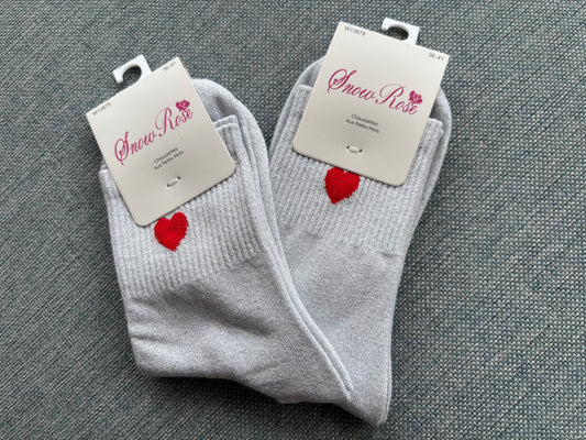 Les chaussettes d’amour blanc argenté