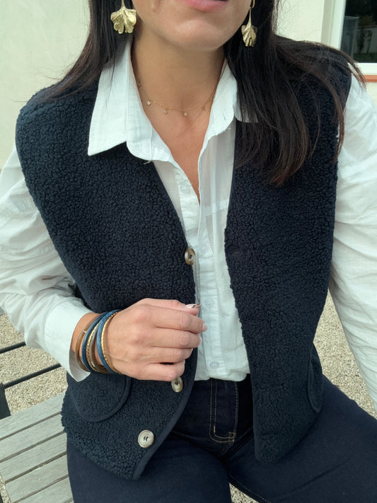 Le gilet sans manche marine