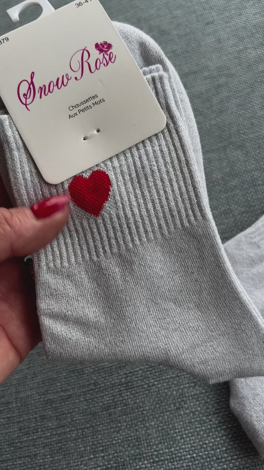 Les chaussettes d’amour blanc argenté